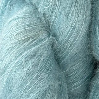 A skein of Suri Silk yarn in the colour Careless Whisper