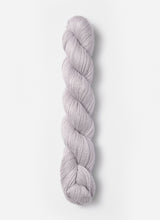 Load image into Gallery viewer, A skein of  Blue Sky Fibers Alpaca Silk yarn in Dove from Green Gable Alpacas.
